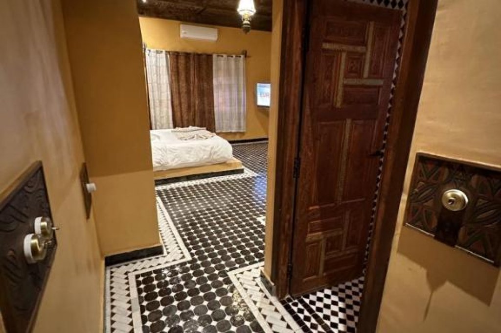 Dvoulůžkový pokoj s manželskou postelí a vlastní koupelnou