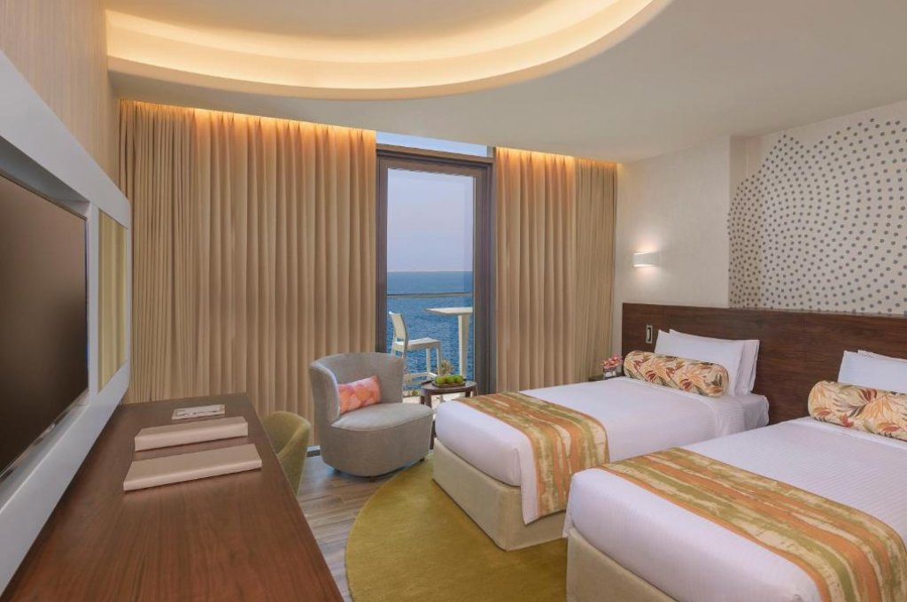 Deluxe Room with Balcony and Partial Sea View