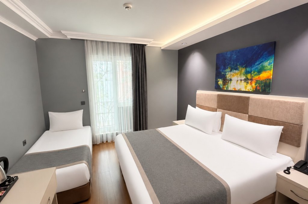Deluxe Triple Room